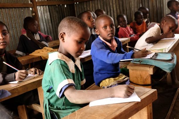 Schoolchildren during lessons in Osiligi
